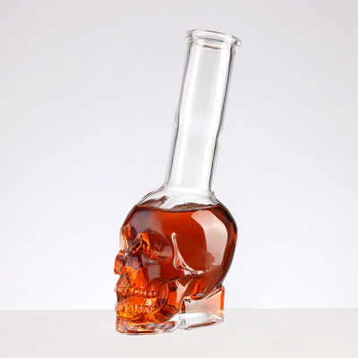 Clients' Specific Requirements Transparent Glass Bottles with Skull Shaped Long Neck